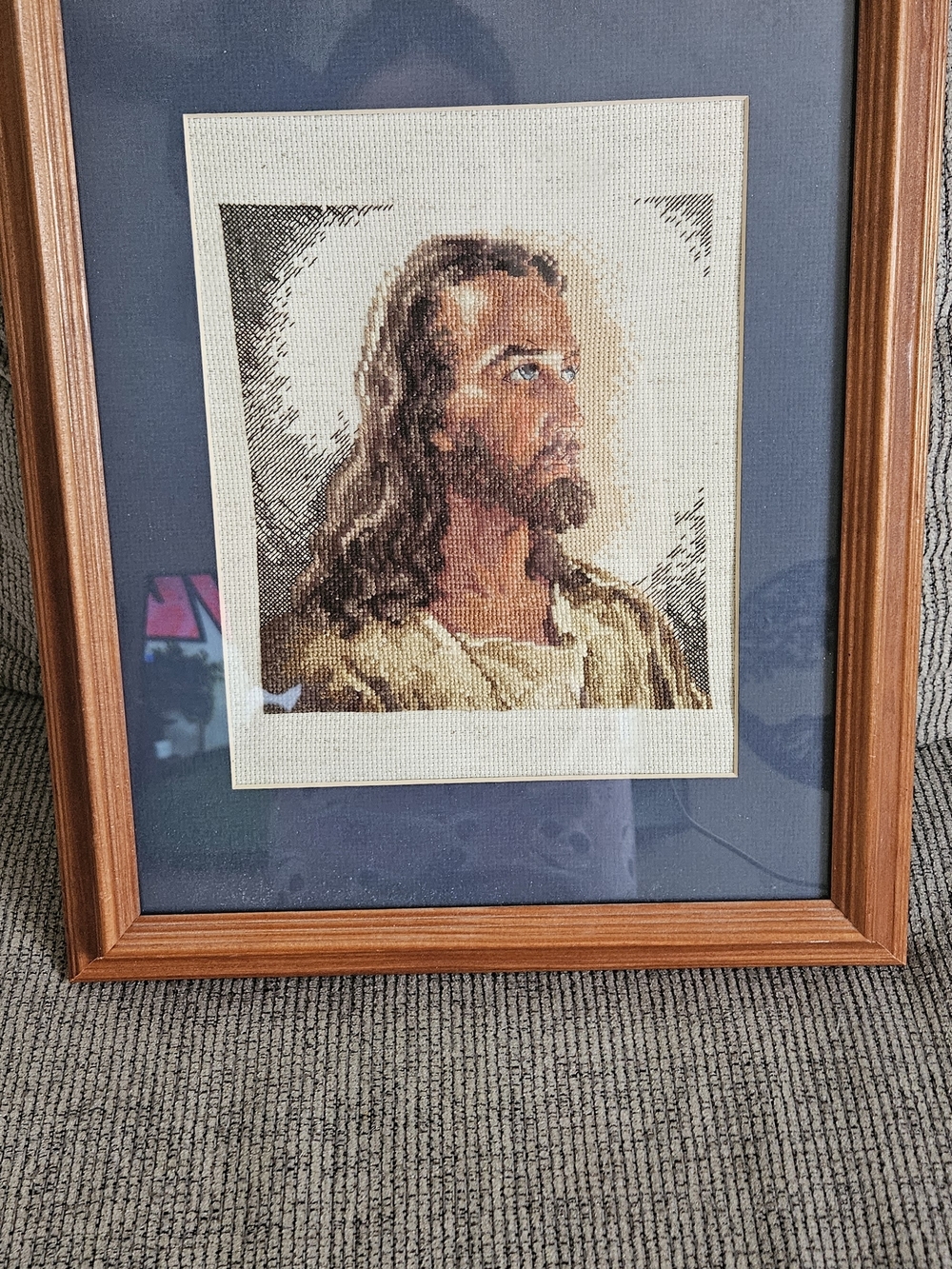 Framed Cross Stitch Portrait with Blue Mat and Wood Frame